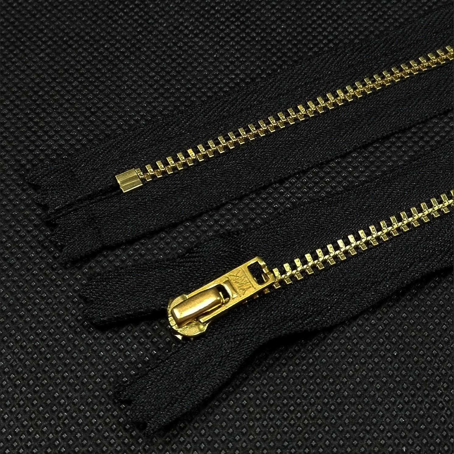 Zamek YKK metalowy nierozdzielczy 16cm mosiądz – 580 czarny